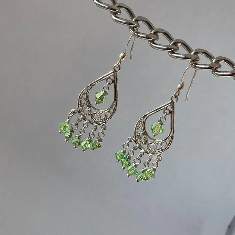 Delicate silver tone and leaf green chandelier earrings